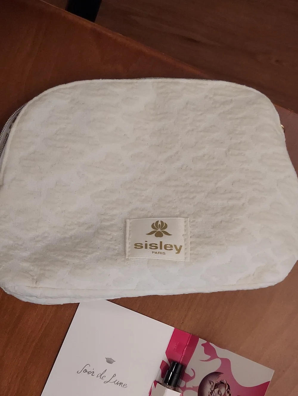 Sisley-Paris Cream Quilted Cosmetic Case with Gold Trim With Parfum Sample
